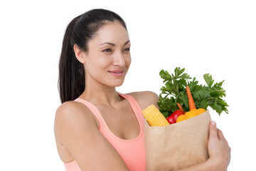 Slim woman holding bag with healthy food