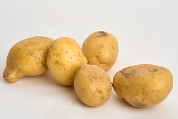 yellow potatoes isolated on white 