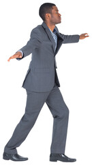 Businessman performing a balancing act