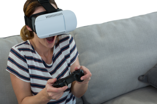 Woman using virtual reality headset and joystick