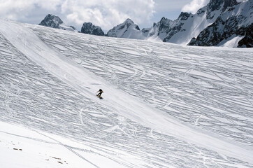 Snowboarder riding on a mountainside