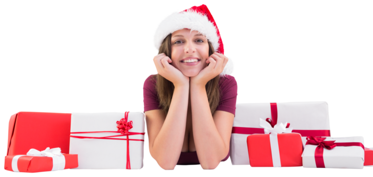 Festive brunette lying on the floor with gifts