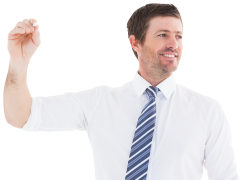 Smiling businessman writing something with white chalk