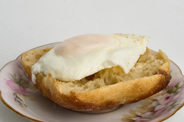 egg over toast isolated on white