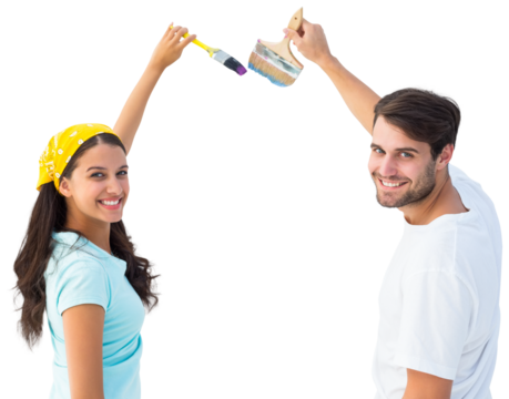 Happy young couple painting together