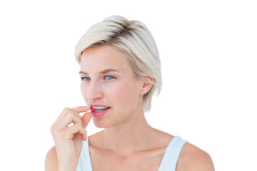 Pretty woman taking pills 