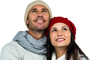 Smiling couple looking up