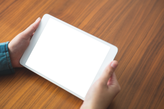 Cropped image of person holding digital tablet