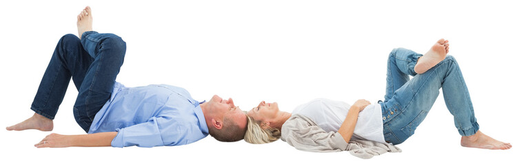 Mature couple lying and smiling