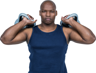 Muscular man exercising with kettlebell 