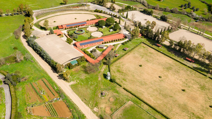 Aerial view of an empty equestrian center.