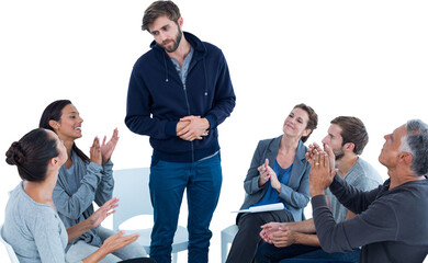 Rehab group applauding delighted man standing up