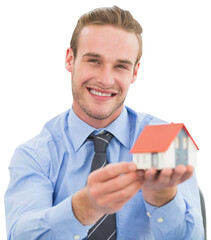 Smiling real estate agent showing house model