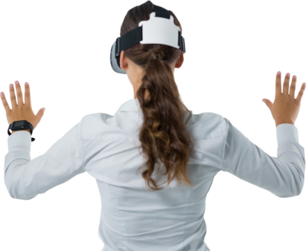 Female executive using virtual reality headset