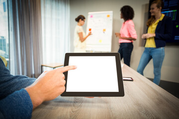 Man showing digital tablet at office