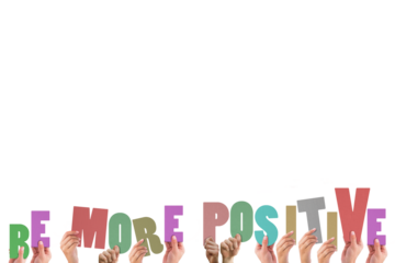 Cropped hands holding colorful words be more positive 