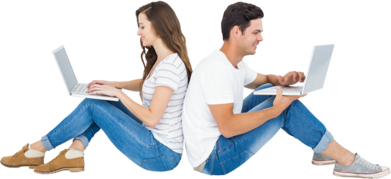 Happy couple sitting on floor back to back using laptop