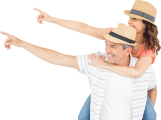 Man piggy backing wife