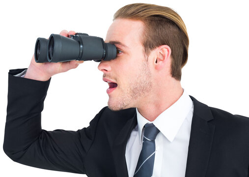 Surprised businessman looking through binoculars - Powered by Adobe