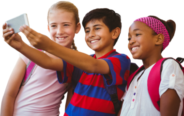 Happy kids taking selfie in school corridor