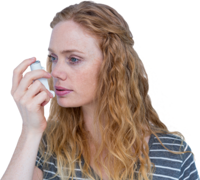 Beautiful woman using the asthma inhaler
