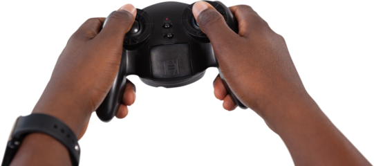 Hand of man playing video game against white background