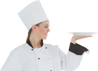 Portrait of a woman chef holding a plate