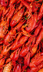 Fragrant boiled crayfish on a wooden board