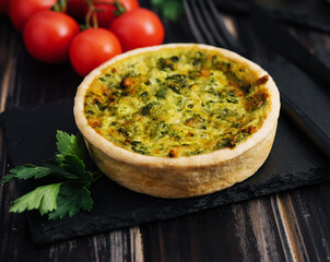 Quiche with spinach - traditional dish of french cuisine