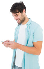Happy casual man sending a text message