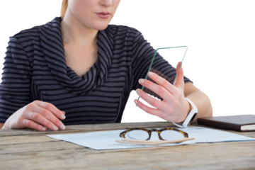 Mid section of businesswoman using transparent glass interface