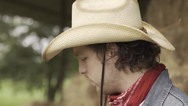 Texan cowboy looking at the horizon on his ranch-4K