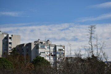 Fototapeta na wymiar brutalist styled buildings on a sunny day in city of Podgorica