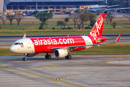 AirAsia Airbus A320 airplane at Bangkok Don Mueang Airport in Thailand