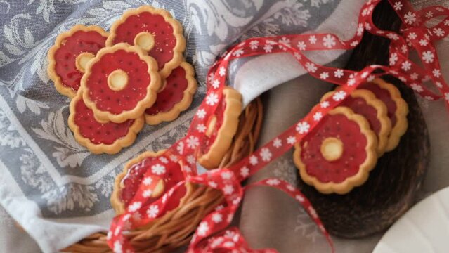 Thumbprint breakfast cookies with raspberry jam. Homemade freshly baked shortbread cookies, Christmas atmospheric mood. Happy New Year