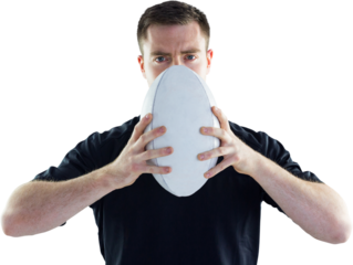 Rugby player holding a rugby ball