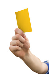 Hand holding up yellow card