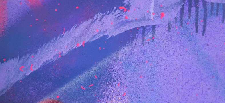 Messy paint strokes and smudges on an old painted wall with graffiti. Colorful drips, flows, streaks of paint and paint sprays