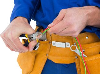 Electrician cutting wires