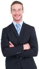 Smiling businessman in suit with arms crossed