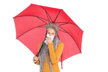 Woman blowing her nose with a tissue