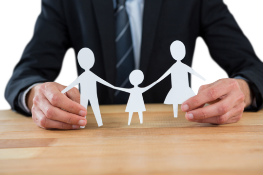 Mid section of businessman holding paper family