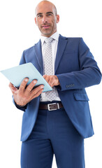 businessman using a tablet and smiling at the camera 