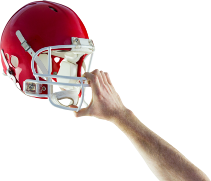 American football player holding up his helmet