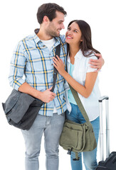 Naklejka premium Attractive young couple going on their holidays