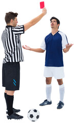 Referee showing red card to a player