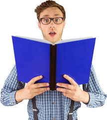 Geeky businessman holding a book