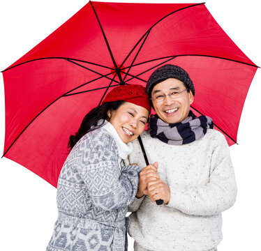 Older Asian Couple Under Umbrella