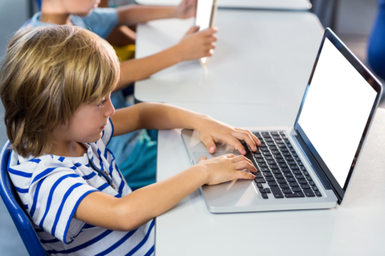 Boy using laptop