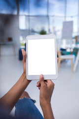 Female executive using digital tablet